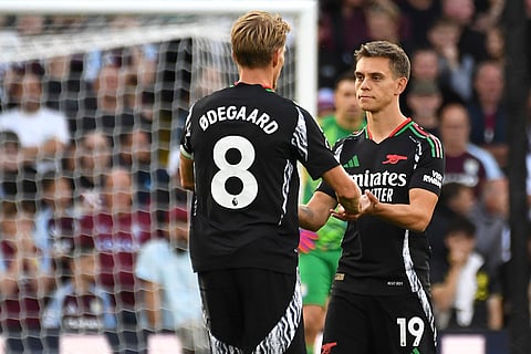 Premier League 2024-25: Arsenal's Leandro Trossard, right, celebrates with Arsenal's Martin Odegaard after scoring his side's opening goal